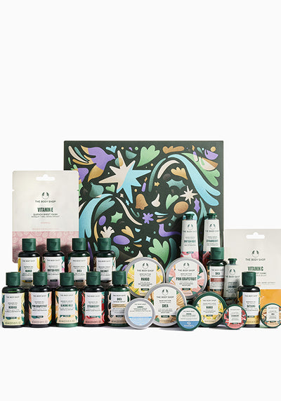 Assorted skincare and beauty products with a decorative box on a white background